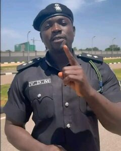 Verydarkman wearing Nigeria Police Force Uniform 